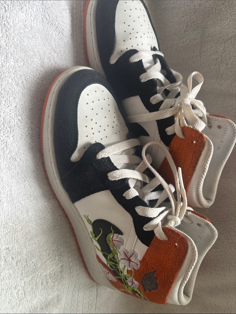 White and Black Floral Accent Low-Top Sneakers